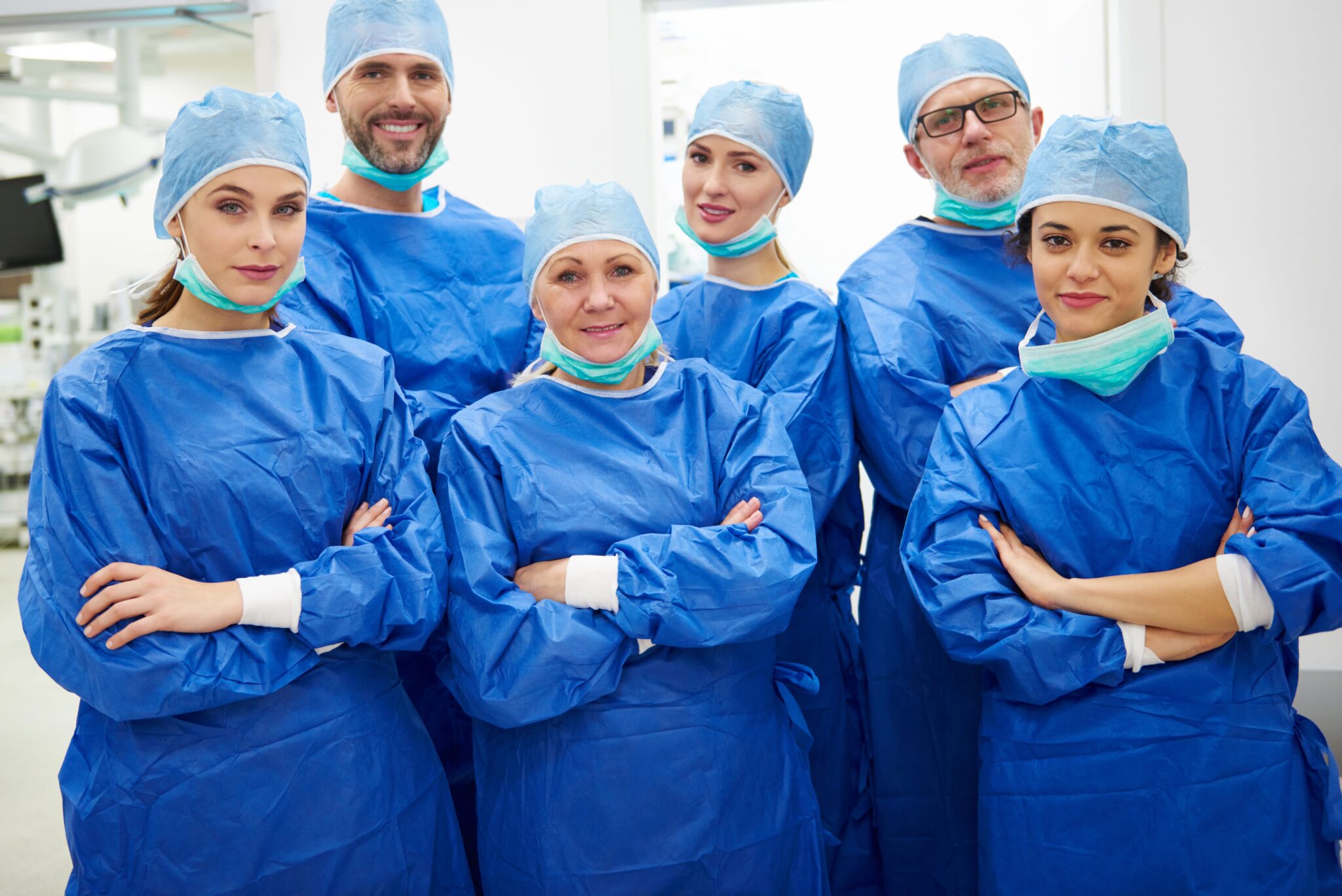 team-cheerful-doctors-surgical-uniform-min